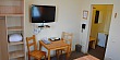 Загородный отель Ирбис - Двухместный номер с двуспальной кроватью улучшенный -  интерьер