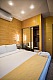 TatarInn - Двухкомнатный люкс на мансардном этаже - Кровать